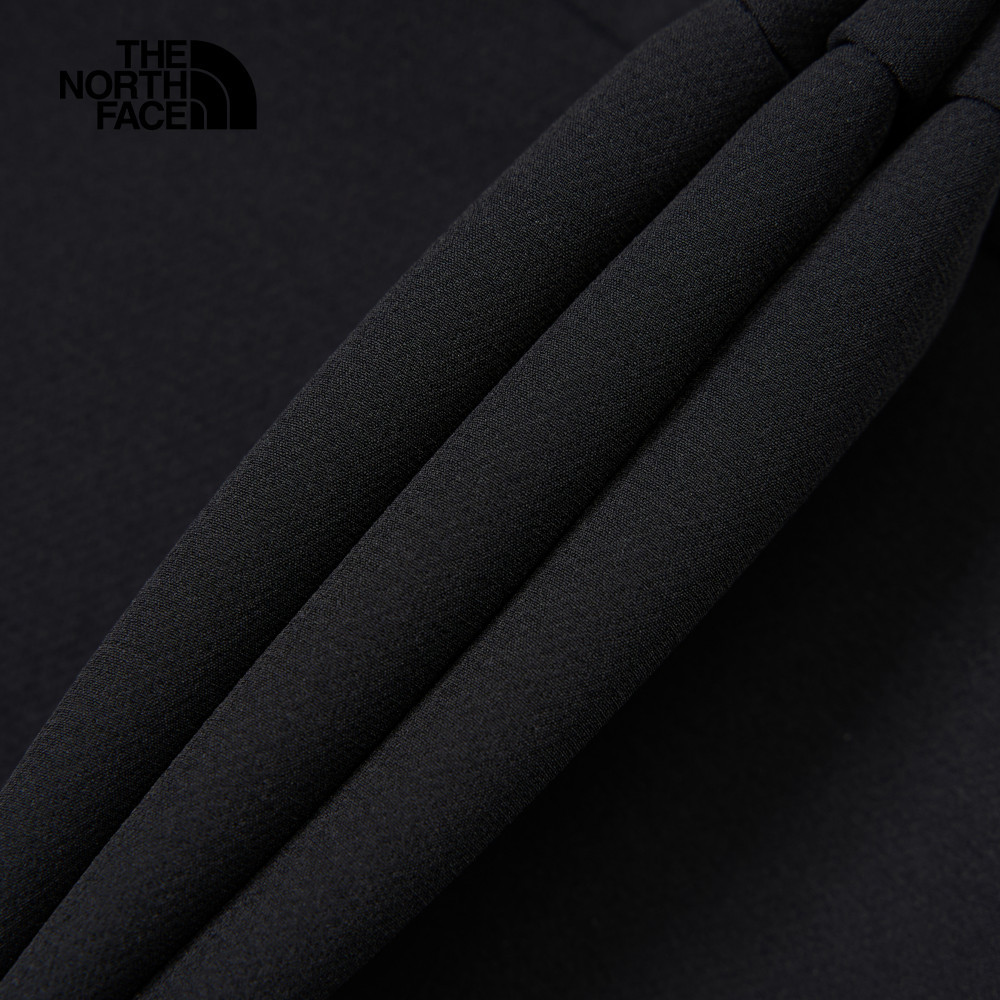 The North Face北面男款黑色DWR防潑水大尺寸印花長袖帽T｜82V64H0