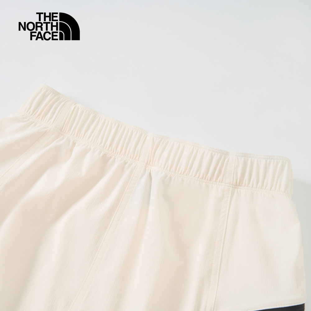 【10/27 00點限時搶購】The North Face北面女款米白色DWR防潑水長裙｜8DGTQLI