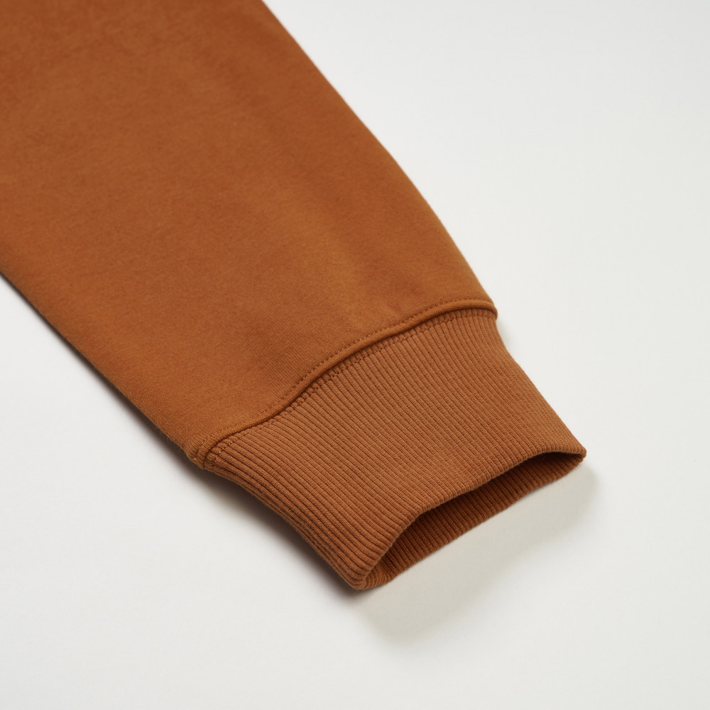 The North Face北面男款橘色大尺寸印花長袖帽T｜8F0QBOE