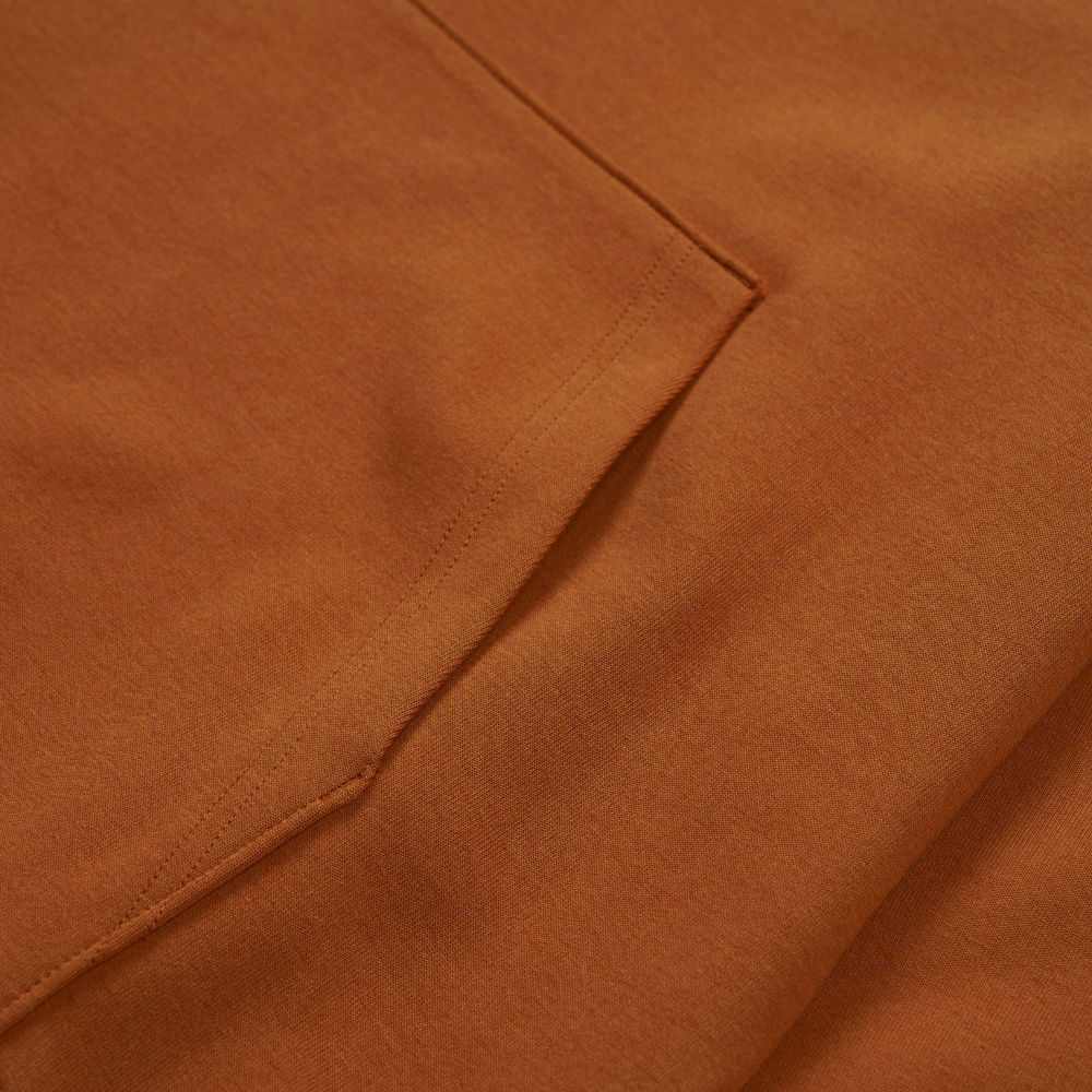 The North Face北面男款橘色大尺寸印花長袖帽T｜8F0QBOE